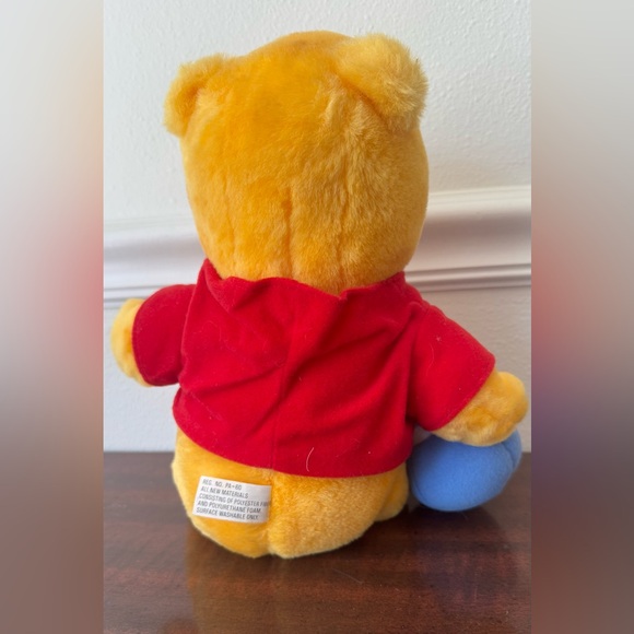 Vintage Disney Pooh Bear Plush Toy with Red and Yellow Colors - Picture 2 of 3